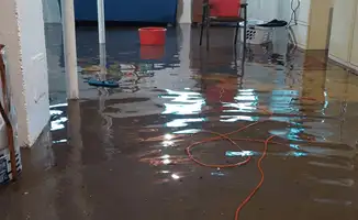 Basement with boiler, cabinets and washing machine completely flooded in Tuscaloosa, AL